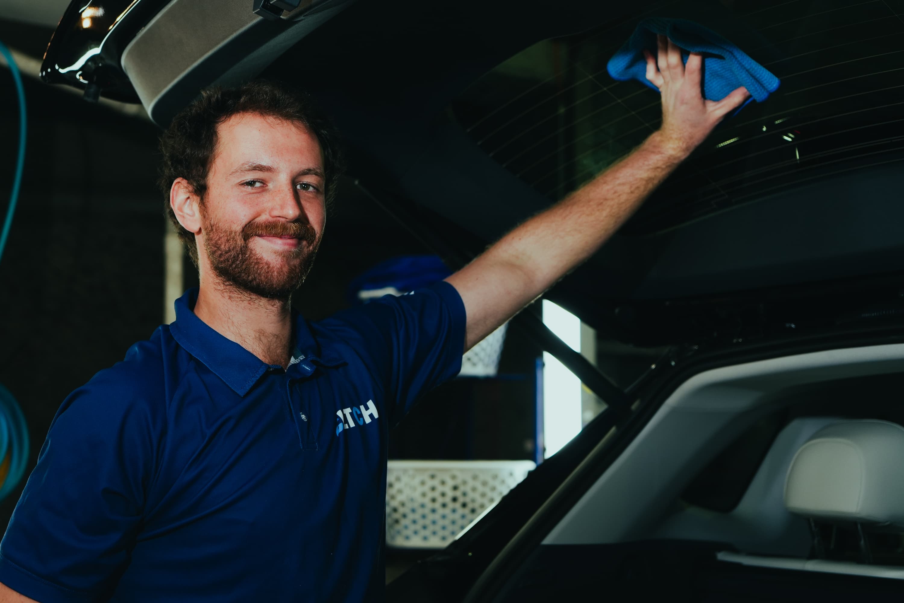 CLTCH crew member at work, smiling at the camera